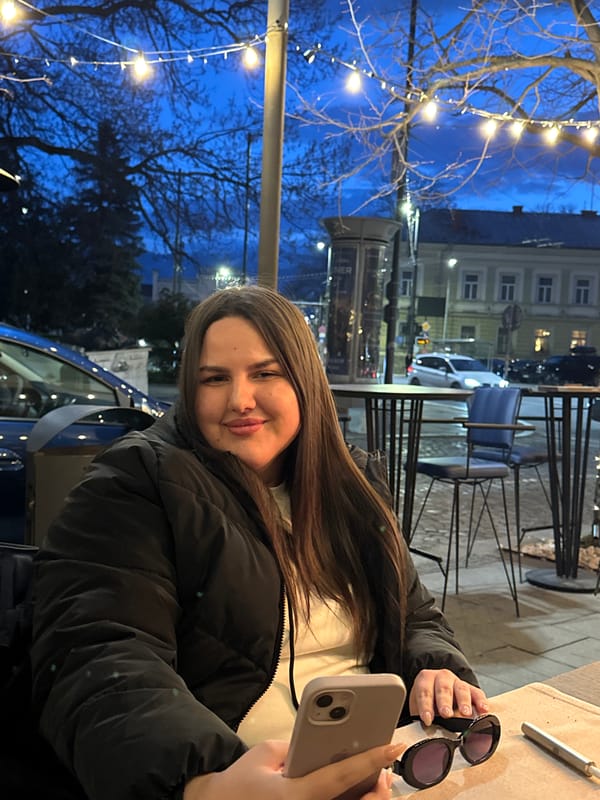 Evening dining scene at decorated urban cafe patio