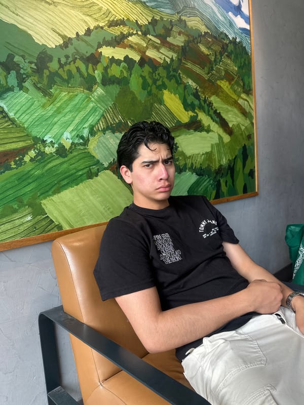 Young man spends evening at Starbucks in Puebla