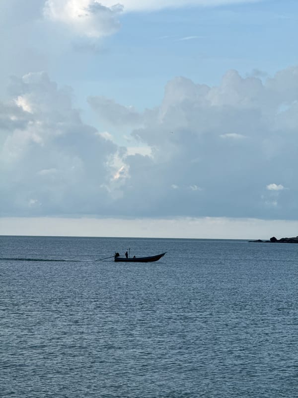 Ban Tai beach and coastline after dark, skies brewing