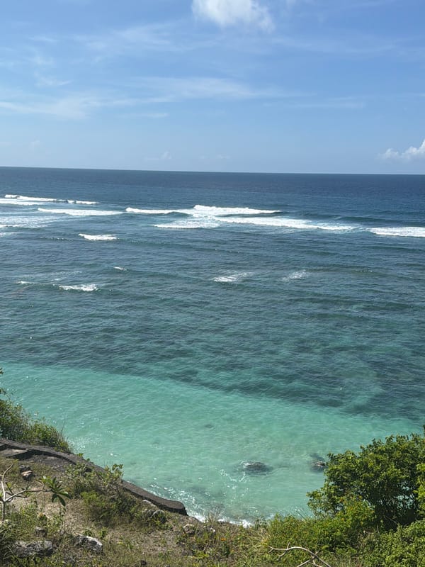 Woman documents early morning coastal tour across Bali beaches
