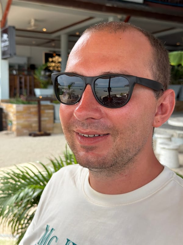 Close-up portrait in Ko Pha-ngan, sunglasses and white tee