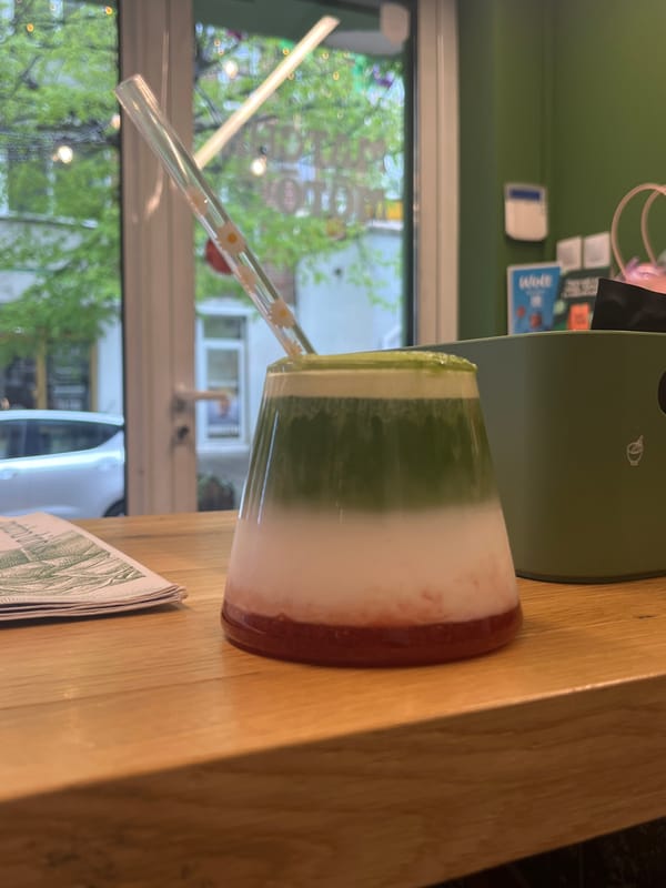 Layered green beverage documented in Sofia cafe