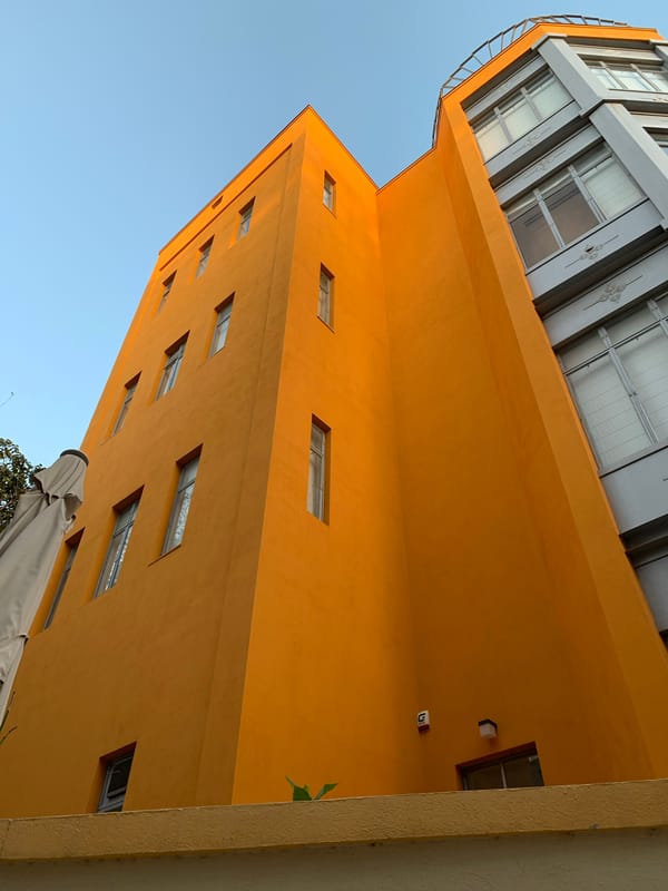 Orange building with angled architecture photographed in Tel Aviv