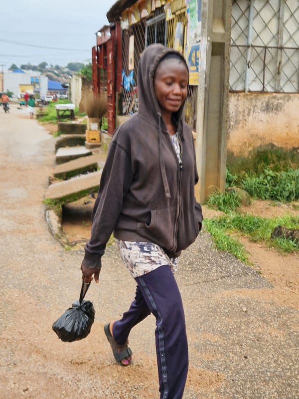 Morning foot traffic on the streets of Kabong, Nigeria