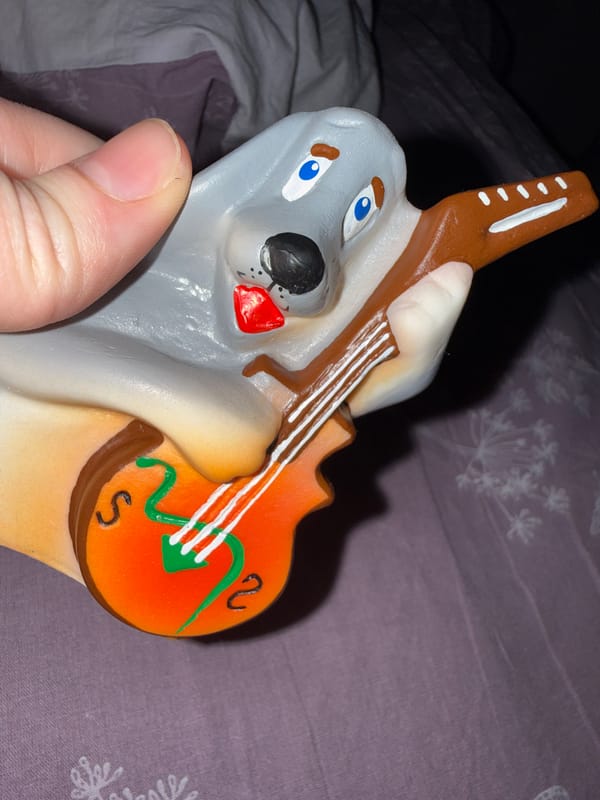 Personal moments captured: portraits, ceramic wolf, drink, cookware