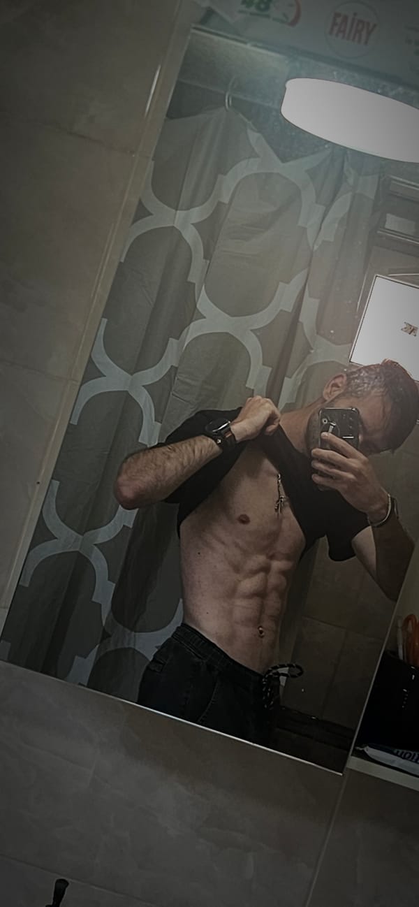 Man takes bathroom mirror selfies in Kostenets, Bulgaria
