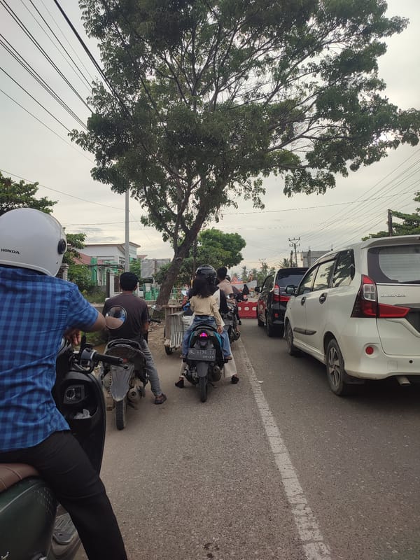 Traffic jam blocks street in Keudebayu, Indonesia