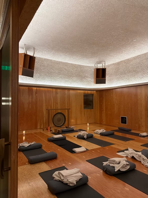 Inside a warmly lit LA yoga studio