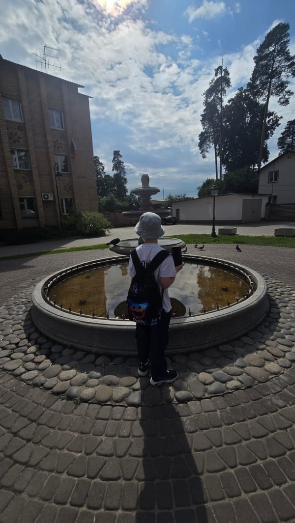 Quiet moment at a stone fountain in Il'inskiy, Russia