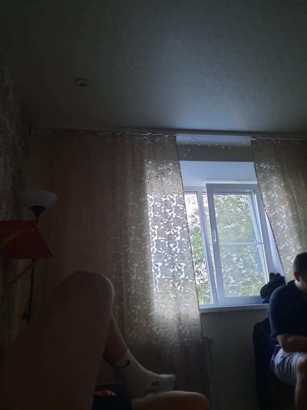 Person relaxes in bedroom with phone for two hours