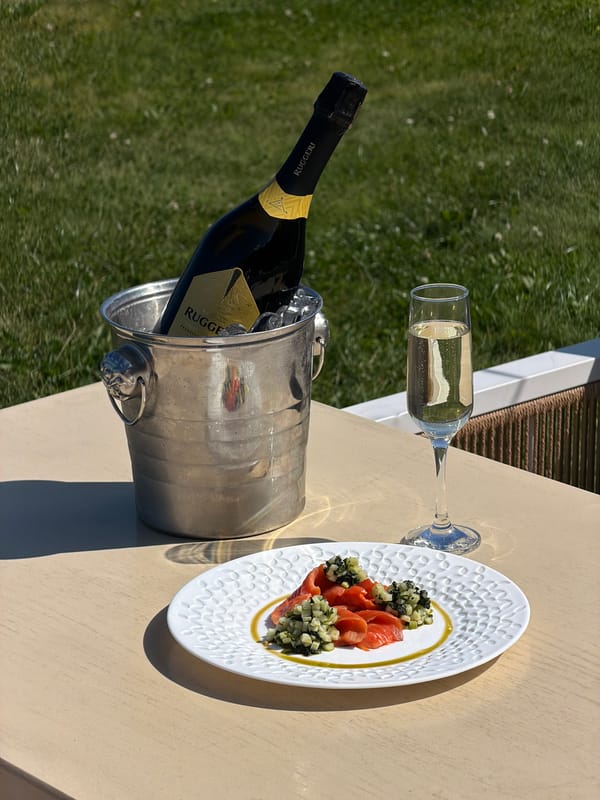 Prosecco, salmon, and green cocktails at a relaxed brunch table