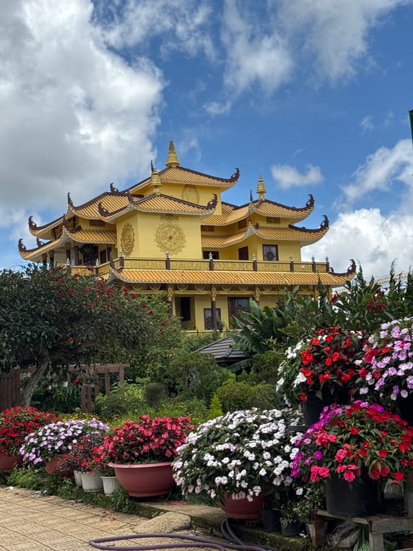 Buddhist temple ceremony with food offerings in Da Lat