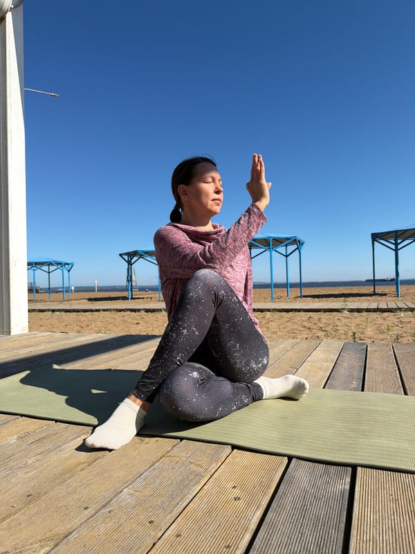 Early morning yoga session held on Chaikovsky waterfront deck