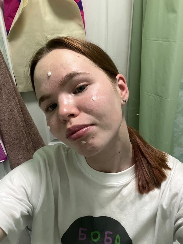 Woman documents evening skincare routine in Chaikovsky bathroom selfies