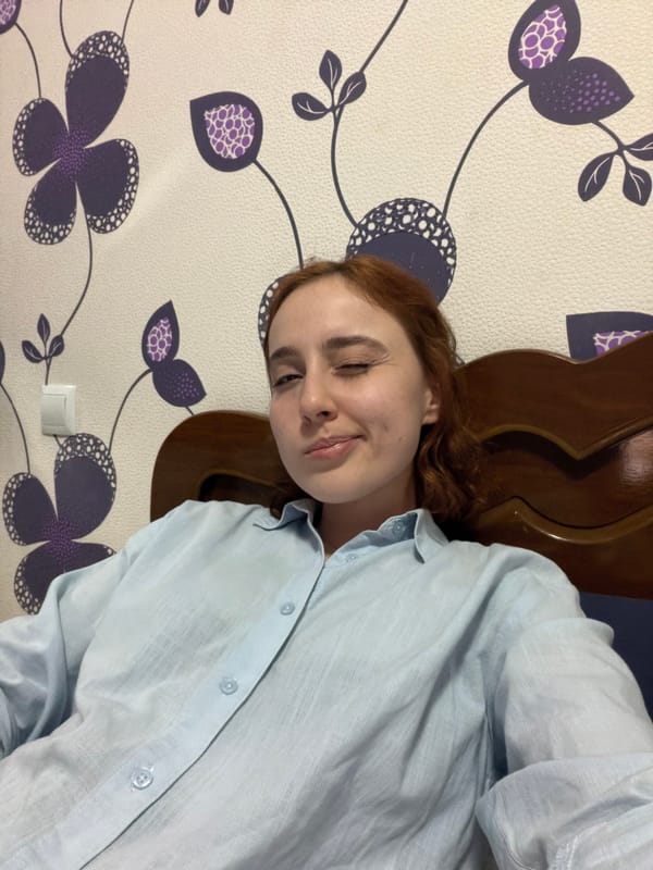Woman photographed in bedroom poses during two-minute span in Tbilisi