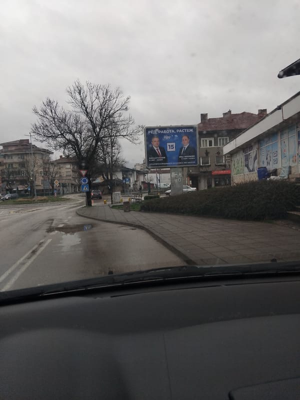 Political billboard spotted on Troyan street under overcast skies