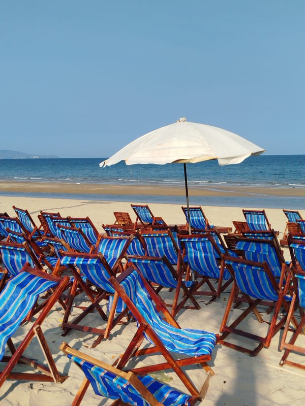 Fisherman works nets, catches fish on Ho Chi Minh beach