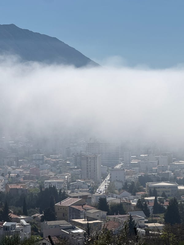 Morning fog blankets Šušanj, Montenegro coastal city