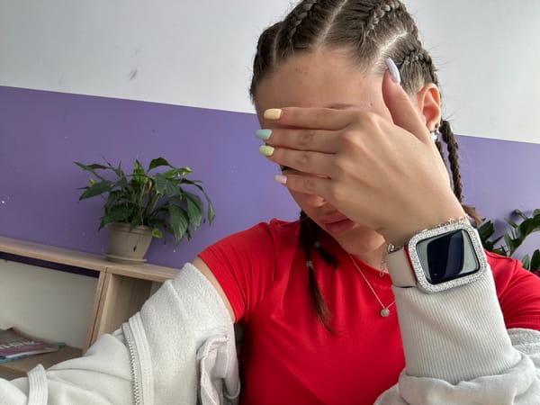 Person covers face with hand in Sofia Bulgaria