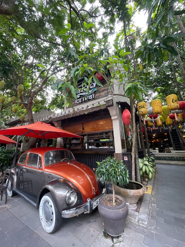 Street scenes near a Da Nang café strip, lanterns and construction included