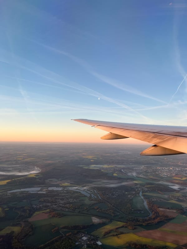 Dawn flight captures golden sky over French countryside