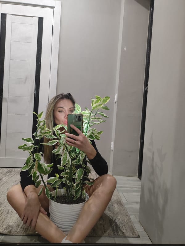 Person takes mirror selfies indoors in Votkinsk, Russia