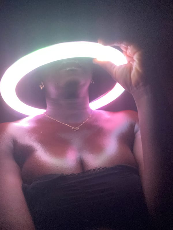 Creative ring light photography session documented in Maigizo, Nigeria