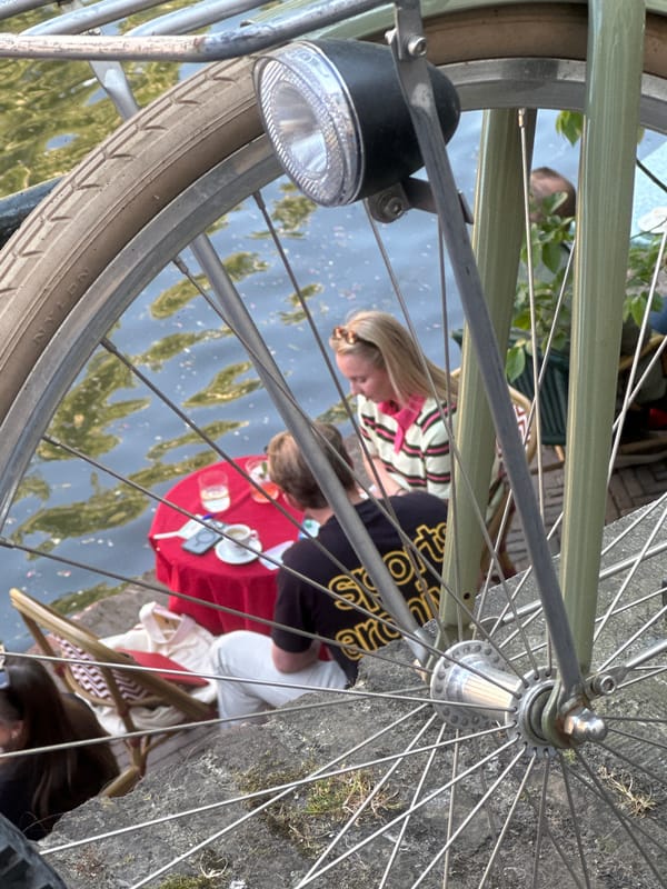 Weekend afternoon life unfolds in Utrecht's canal district