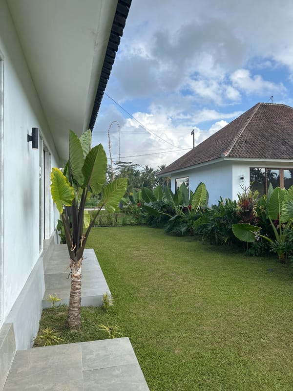 Inside and outside a modern Tembuku villa, Bali