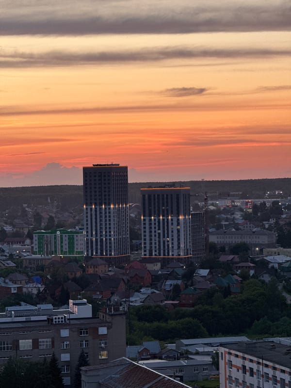 Novosibirsk skyline glows under a golden hour sky
