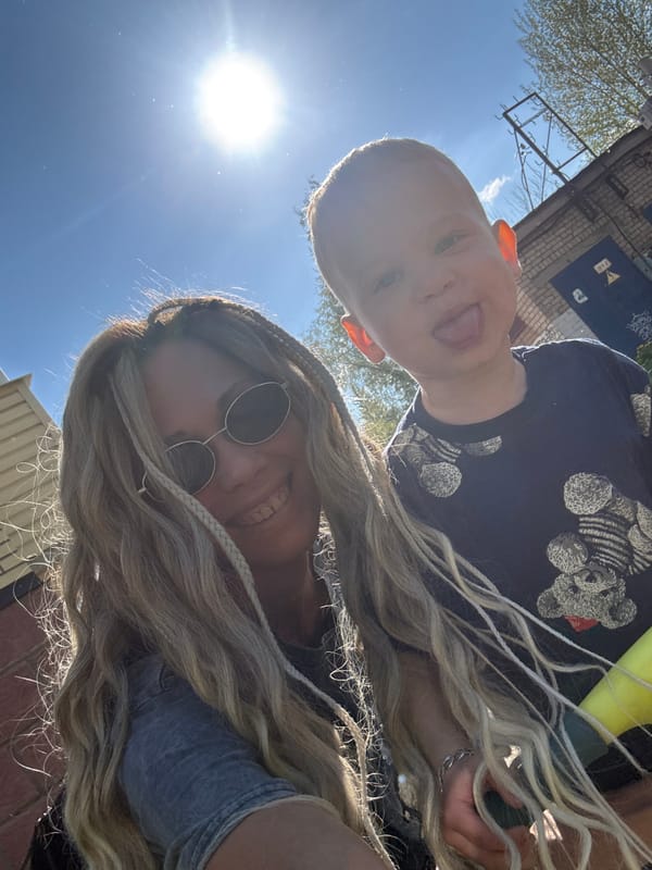 Family captures spring selfies among blooming trees in Rusanovo