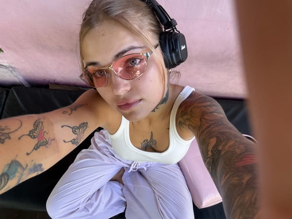 Woman in pajamas relaxes outdoors in North Kuta