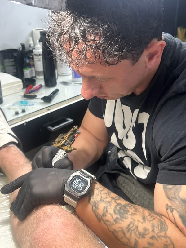 Tattoo session documented at Targovishte business