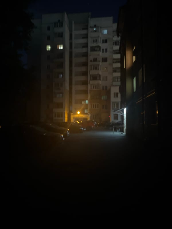 Nighttime streets of Vitsebsk, flags on lampposts, city quiet
