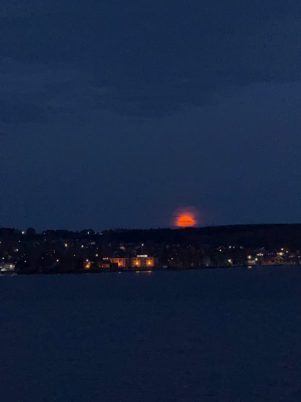 Orange glow illuminates night sky over Votkinsk, Russia