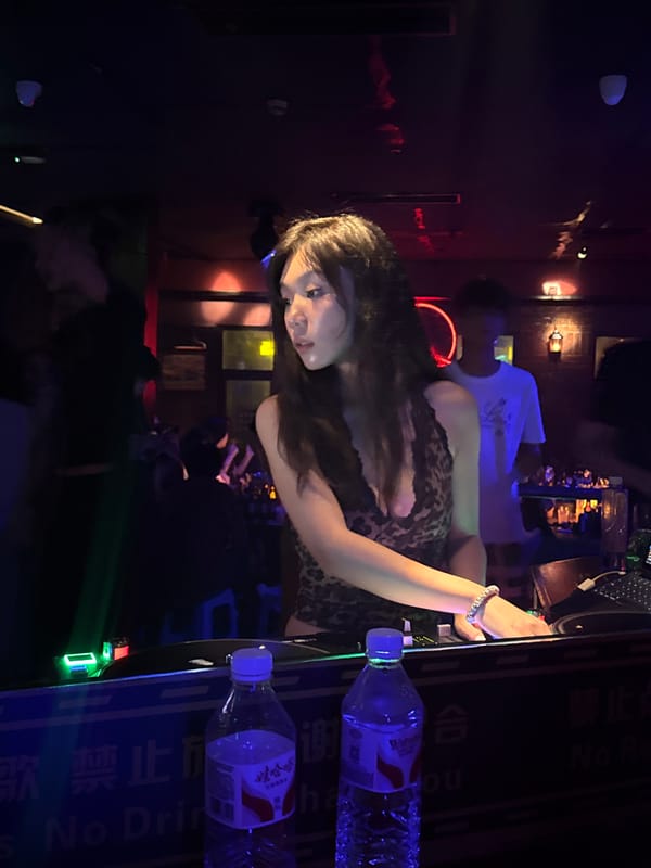 DJ set underway at a packed Liangjiang nightclub