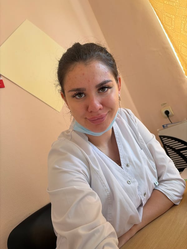 Medical professional pauses for a photo on a Russian street