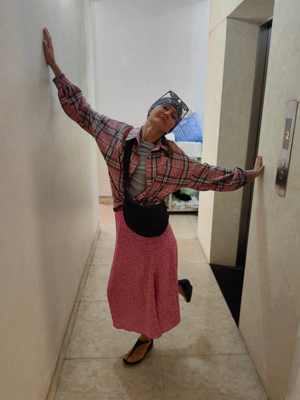 Woman poses in building hallway in Bai Chay Ward