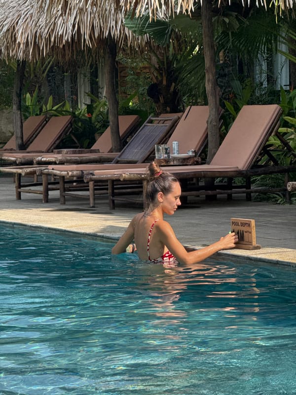 Tourists enjoy morning pool time at Vietnamese resort
