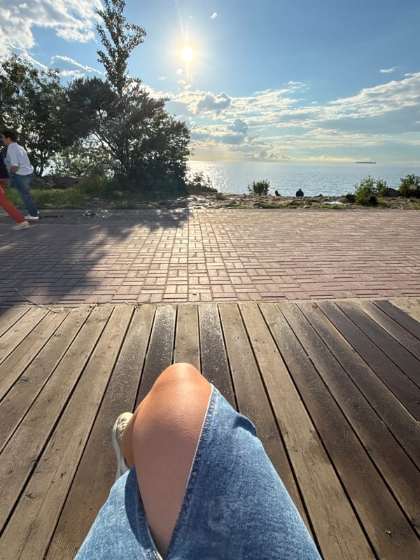 Afternoon waterfront stroll with selfies along urban canal