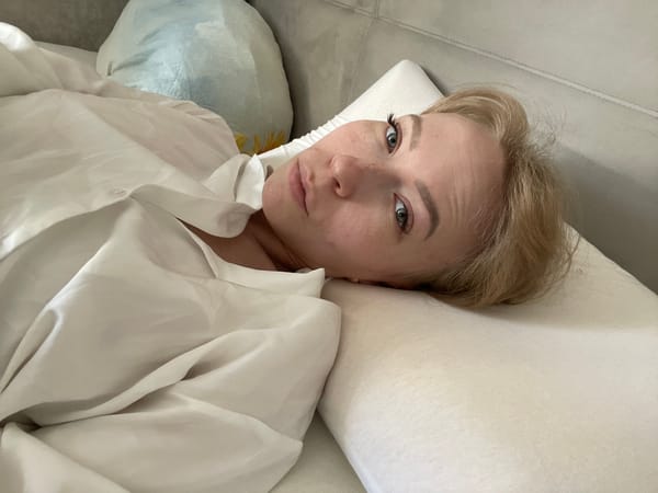 Woman photographed resting indoors in Perm, Russia