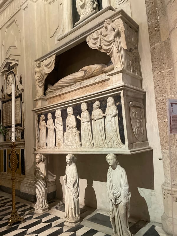 Tourist documents historic churches and religious sites in Naples