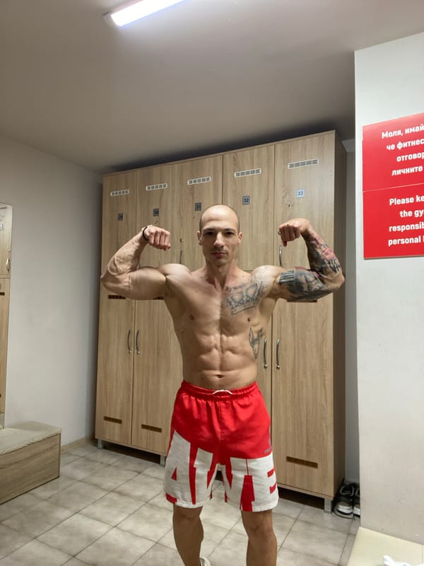 Man flexes in gym locker room in Pleven