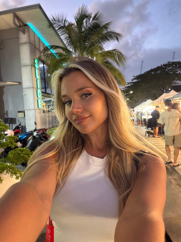 Selfie at a lit street market in Choeng Thale, Thailand