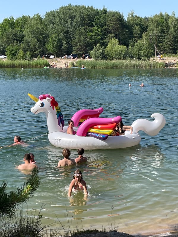 Giant inflatable unicorn draws a crowd at a Belarus lake