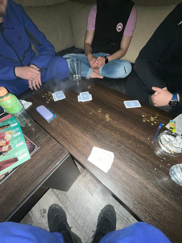 Four people gathered indoors in Svishtov, Bulgaria