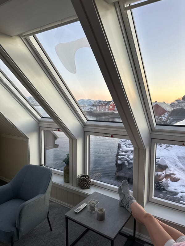 Winter morning captured from deck overlooking Stamsund harbor cabins