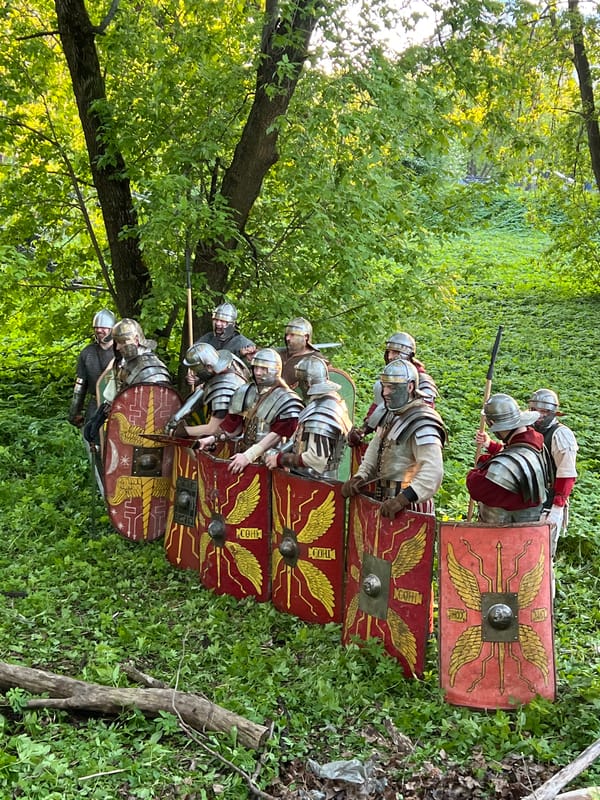 Roman reenactors gather in wooded area near Saint Petersburg