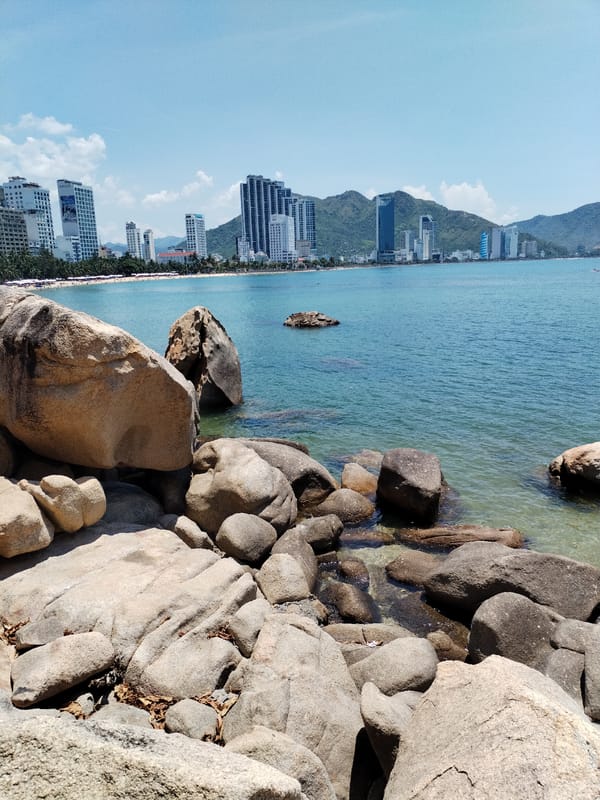 Strolling Nha Trang's coastal promenade on a sunny morning