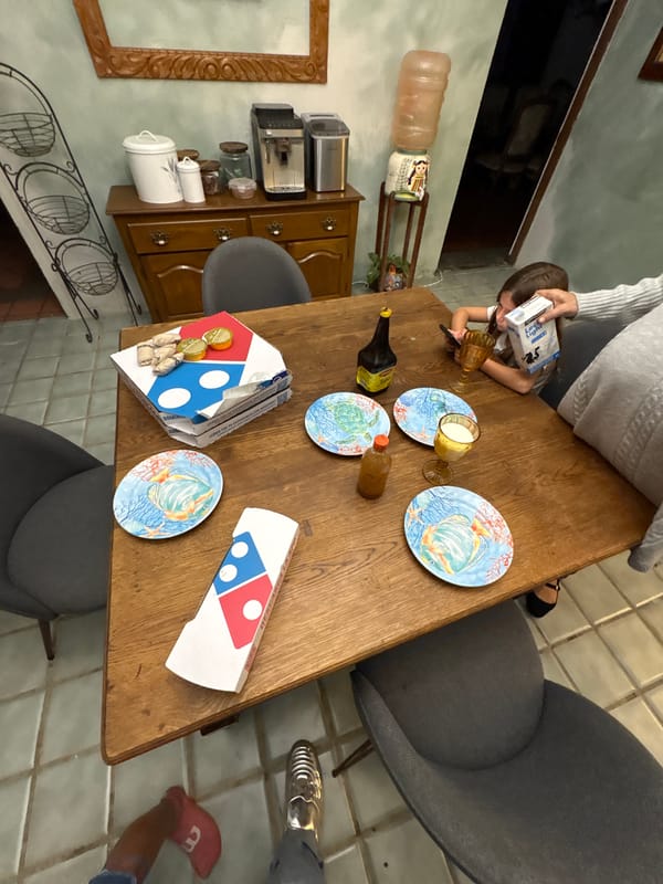Children share late-night meal in Puebla, Mexico